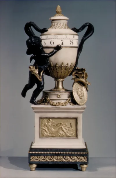 Loskamilos1 - Wykonany około 1775 roku marmurowy zegar, którego obudowa została wykon...