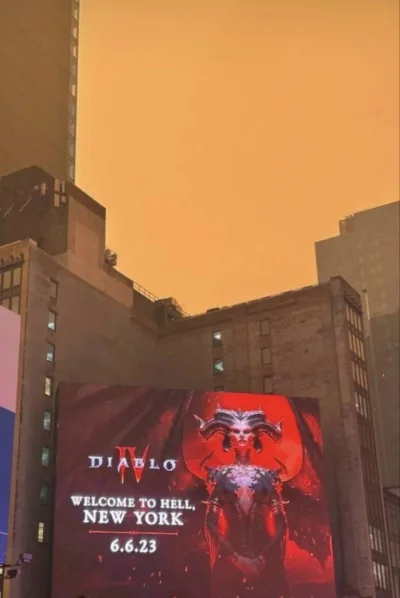 kinson - Baner reklamowy gry Diablo IV na tle łun od pożarów lasów w Kanadzie. 
#diab...