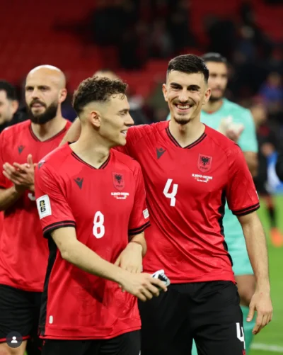 Tymczas0wy - Juljan Shehu świętujący zwycięstwo 1:0 nad Reprezentacją Polski w marcow...