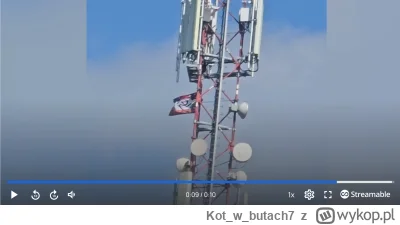 Kotwbutach7 - Tu stopklatka z filmiku. Dlaczego ta szmata jest czerwono-czarna?