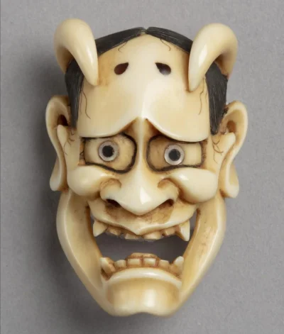 Loskamilos1 - Netsuke, dawna ozdobna figurka, tutaj w kształcie twarzy demona nazywan...