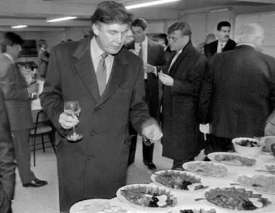 walenty-merkel - Post-Soviet visual. Donald Trump visits a reception as he checks out...