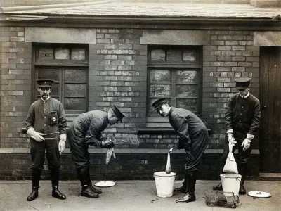 cheeseandonion - Photograph of Liverpool Port Sanitary Authority rat-catchers dipping...