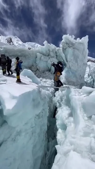 cheeseandonion - Crossing the Khumbu Icefall on Mount Everest using ladders

This ice...