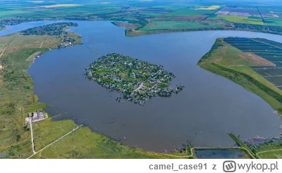 camel_case91 - W wyniku powodzi spowodowanej przez zniszczenie tamy w Nowej Kachowce,...