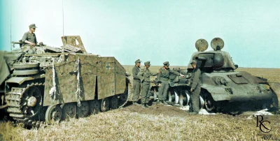 wojna - Załoga niemieckiego niszczyciela czołgów StuG III Ausf. G sprawdza zniszczony...