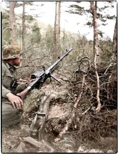 wojna - Strzelec MG 137. Pułku Piechoty, 2. Dywizji Strzelców Górskich ze swoim MG 34...