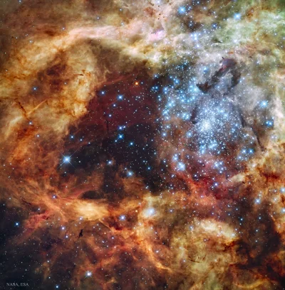 ntdc - R136 to gromada gwiazd położona w Mgławicy Tarantula należącej do galaktyki Wi...