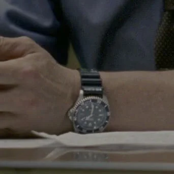 HagbardGodman - Szukam budżetowego zegarka z czarną bransoletą, coś podobnego do tego...