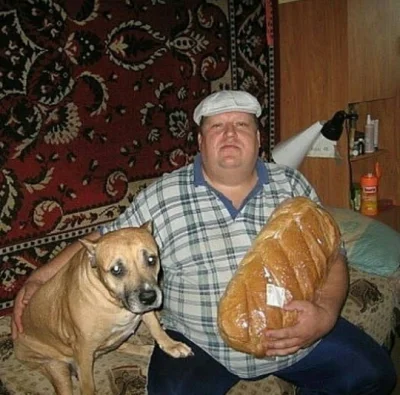 p.....d - chłop z chlebem siedzi