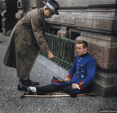 wojna - Niemiecki weteran I wojny światowej, żebrzący na ulicach Berlina. 

1923r.
...