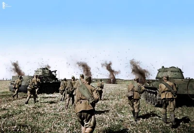 wojna - Radziecka piechota i czołgi T-34 w czasie natarcia na łuku Kurskim.

1943r....