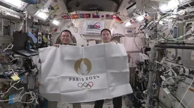 waro - 15. Symboliczne przekazanie flagi olimpijskiej na ISS. Następne igrzyska już z...