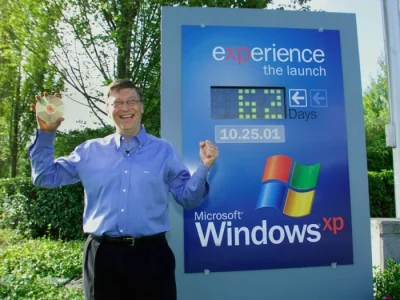 4ntymateria - Bill Gates trzyma dysk Windows XP obok licznika pokazującego liczbę dni...