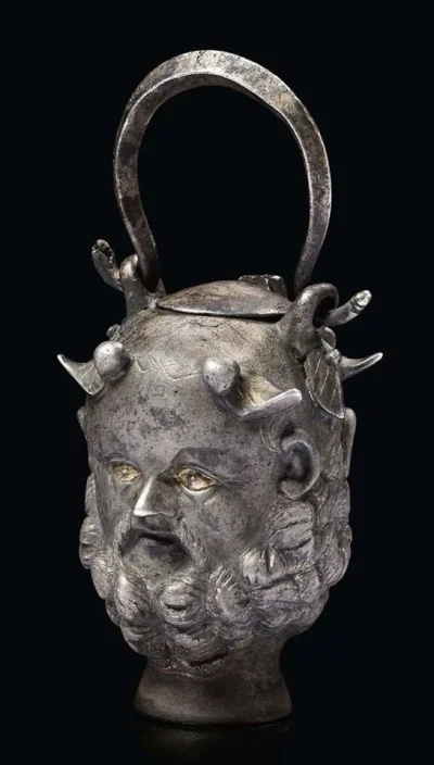 IMPERIUMROMANUM - Rzymskie balsamarium w kształcie głowy Janusa

Rzymskie srebrne n...