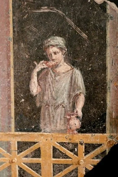 IMPERIUMROMANUM - Kobieta na balkonie na rzymskim fresku

Rzymski fresk ukazujący k...