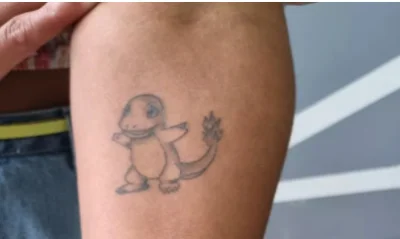 covid_duck - Ładny tattoo se pierdzielnąłem? xd

#koronawirus #tatuaze #charmander ...