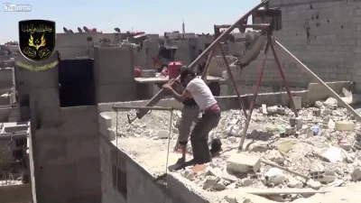 cheeseandonion - >Syrian rebels use homemade trebuchet to fight enemies

#randomgif