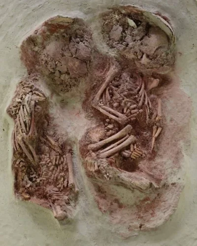 cheeseandonion - >Two baby boys, whose bodies were covered in red ochre and buried un...