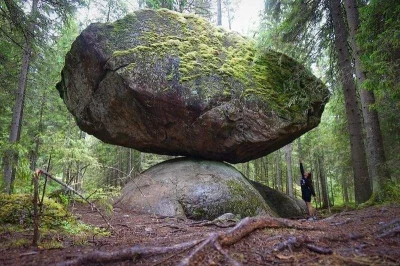 pogop - Kummakivi is a 500 tons rock in Finland that has been balancing on top of ano...