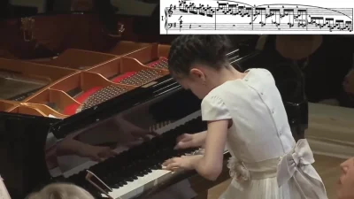 cheeseandonion - >11 year old girl Alexandra Dovgan playing a fast pace piano concert...