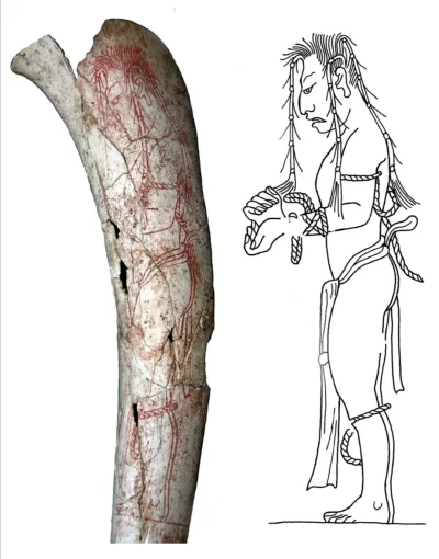 Loskamilos1 - Kość przedstawiająca wyrzeźbiony obraz pojmanego jeńca z królestwa Kaan...