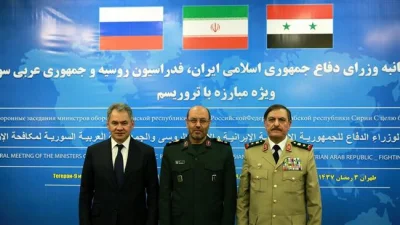 Martwiak - Iranian Defense Minister Brigadier General Hossein Dehqan (C) meets with h...