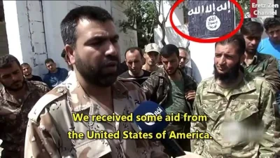 MWittmann - ISIS jest popierane i finansowane przez USA :). Flaga ISIS w tle. Tak bar...