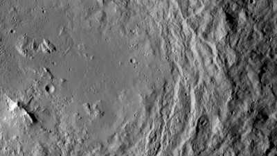 d.....f - NASA's Dawn spacecraft took this image that shows a mountain ridge, near lo...