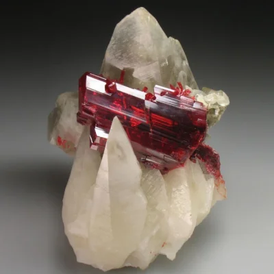 D.....t - Realgar on Calcite
#kamyczek #mineraly 
jesus christ they're minerals #pd...
