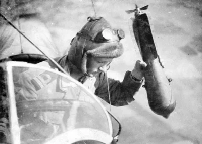Lizus_Chytrus - > An english military aviator are dropping a bomb, during the flight,...