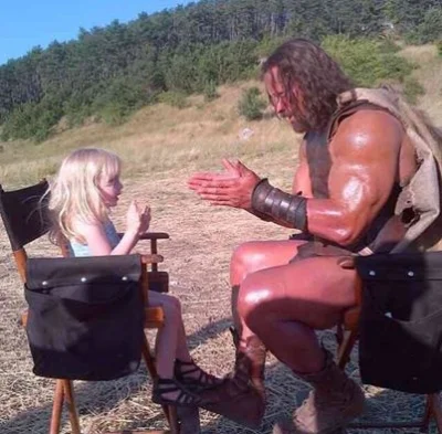 D.....k - > When a 3yr old asks HERCULES to play patty cake in the middle of shooting...
