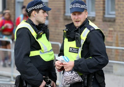 igorscientist - @Amadeo: Officers are pictured with a bag full of empty nitrous oxide...