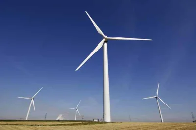 k.....n - Two windmills are standing in a field and one asks the other, "What kind of...