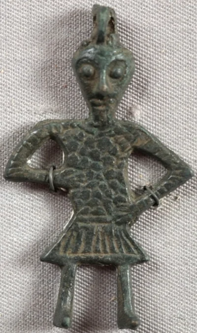 binuska - Peruńczyk - jedna z zawieszek, amuletów przedstawiających słowiańskiego bog...