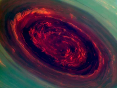 O.....Y - Zdjęcie huraganu na Saturnie wykonane przez sondę Cassini. Chmury w jego wn...