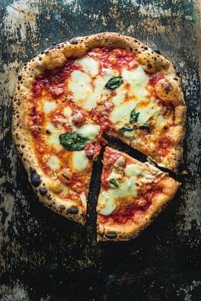 m.....I - Dobra Mireczki, kto się chce nauczyć jak robić
prawdziwą włoską pizzę?

...