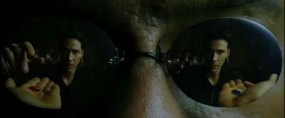 M.....k - > In matrix (1999), Neo taking the pill is only visible in the Red Pill len...