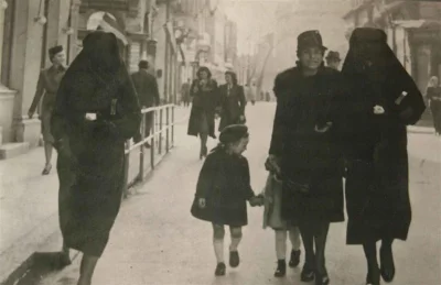 Opipramoli_dihydrochloridum - "A Muslim woman covers the yellow star of her Jewish ne...