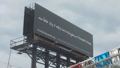 enforcer - > Donald Trump cannot read this, yet he's afraid of it
Billboard na obrze...