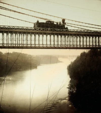 N.....h - Lokomotywa na moście, w tle Niagara.
#fotohistoria