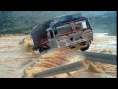 starnak - Heavy Truck Cars Crossing the Heavy Flood River