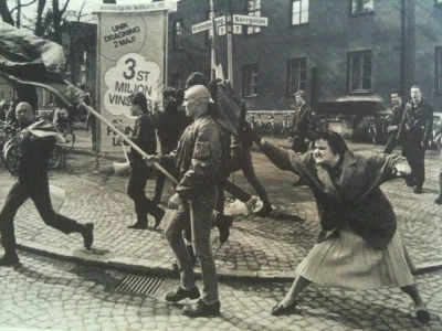 Argetlam - > A woman hitting a neo-nazi with her handbag, Sweden, 1985. The woman was...