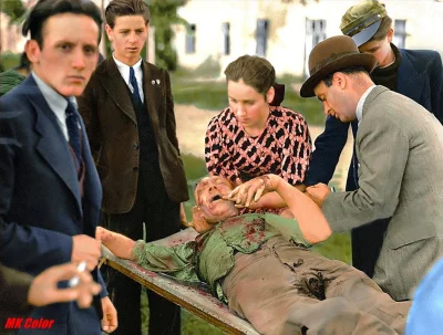 gaim - Wrzesień 1939. Ranny cywil podczas bombardowania Warszawy przez Niemców.
#pol...