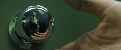 erwit - In The Matrix they couldn't hide the camera in doorknob reflection, so the ca...