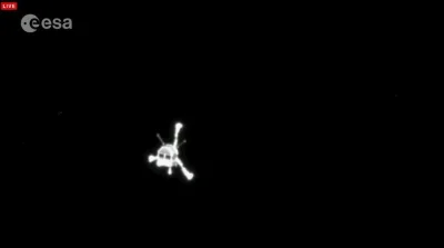 d601 - Zdjęcie lądownika z kamery OSIRIS wykonane w trakcie oddalania się Philae od R...