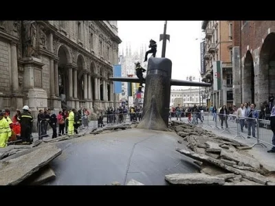grabowski_f - Incredible moment submarine breaks the surface of a Milan STREET...