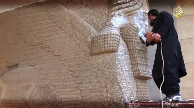 myrmekochoria - Terrorysta z ISIS niszczy Lamassu (40 - 50 ton) strzegące bramy Nerga...