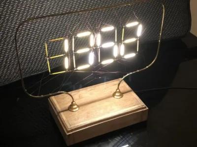 Forbot - Kojarzycie dekoracyjne żarówki LED? Oto zegar sterowany z Arduino, który wyś...