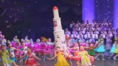 aom - @HANTEK2:

North Korean Kids Dance With Smiling Rocket To Celebrate Lunar New Y...